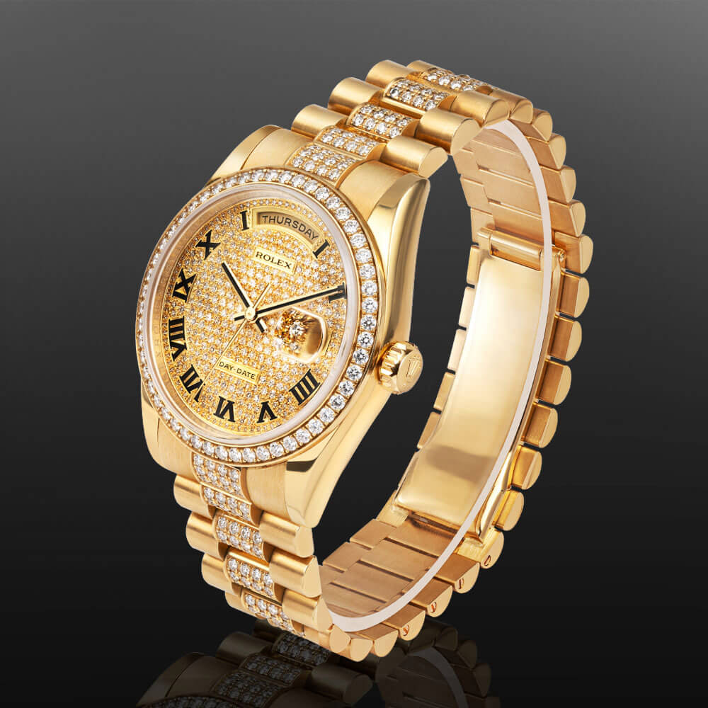 18K Yellow Gold with Diamond Bezel and Pave Roman Dial Wrapped Around a C-Ring with a Black Background.