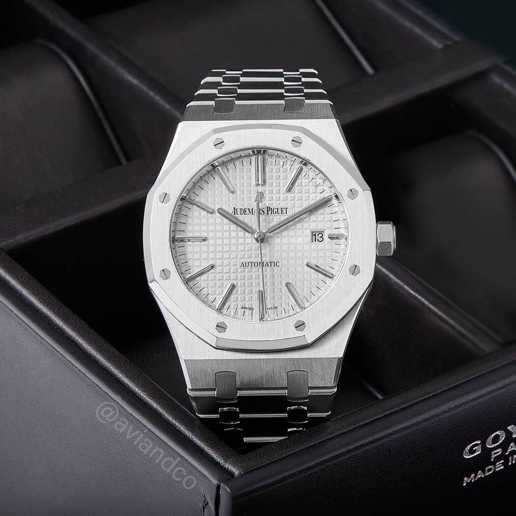 Audemars Piguet Royal Oak with Stainless Steel 34 mm Case, Silver Dial, and Fixed, Stainless Steel Bezel Inside of a Black Leather Watch Case