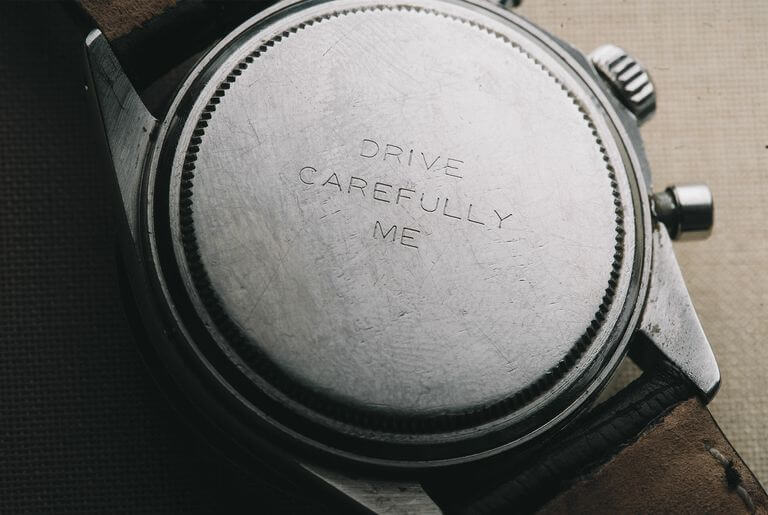 Closeup of the Caseback from Paul Newman’s Infamous Watch Gifted by his Wife which Reads ‘Drive Carefully Me’ 