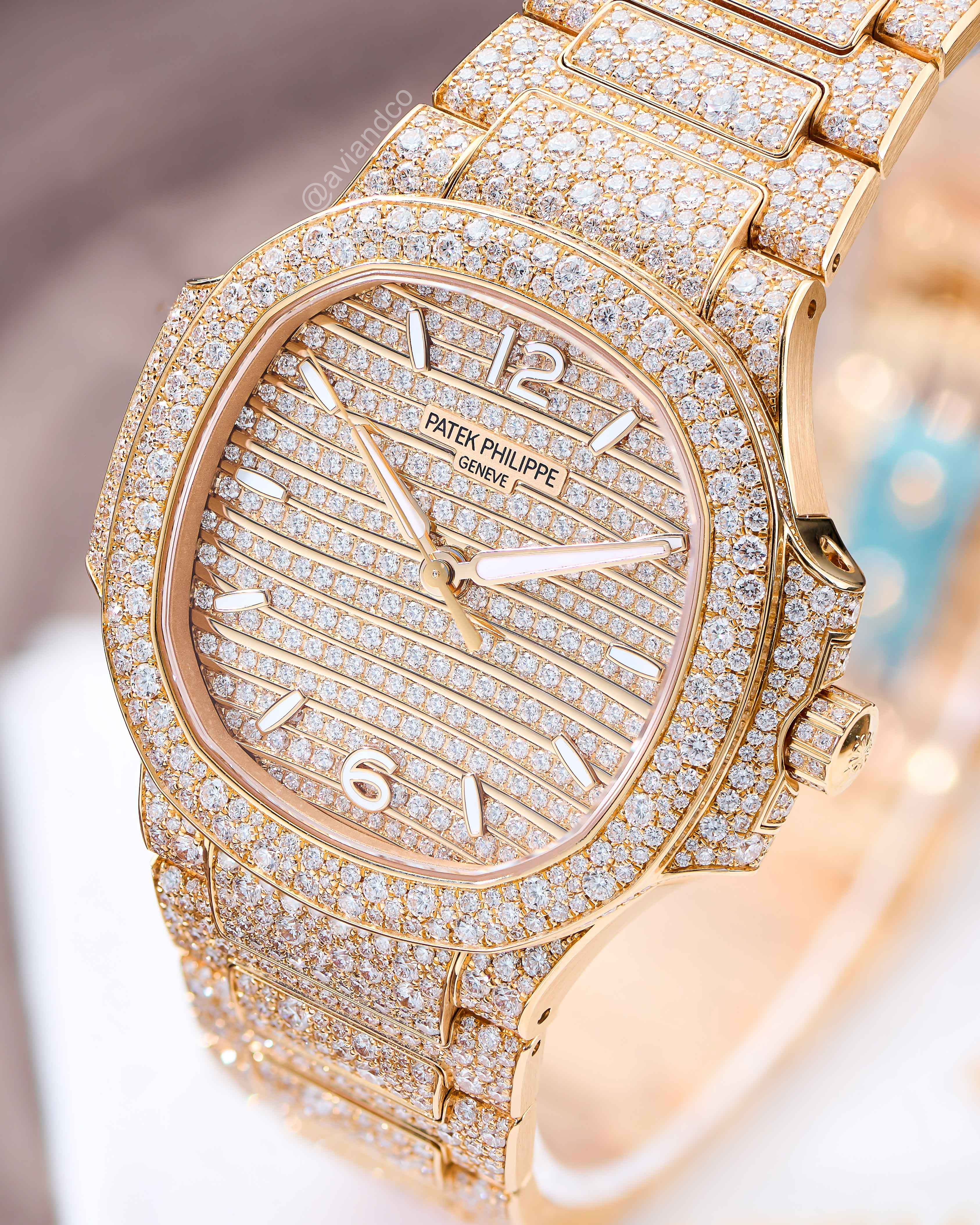 Patek Philippe Nautilus, Rose Gold, Factory Set Diamonds on a Display Ring