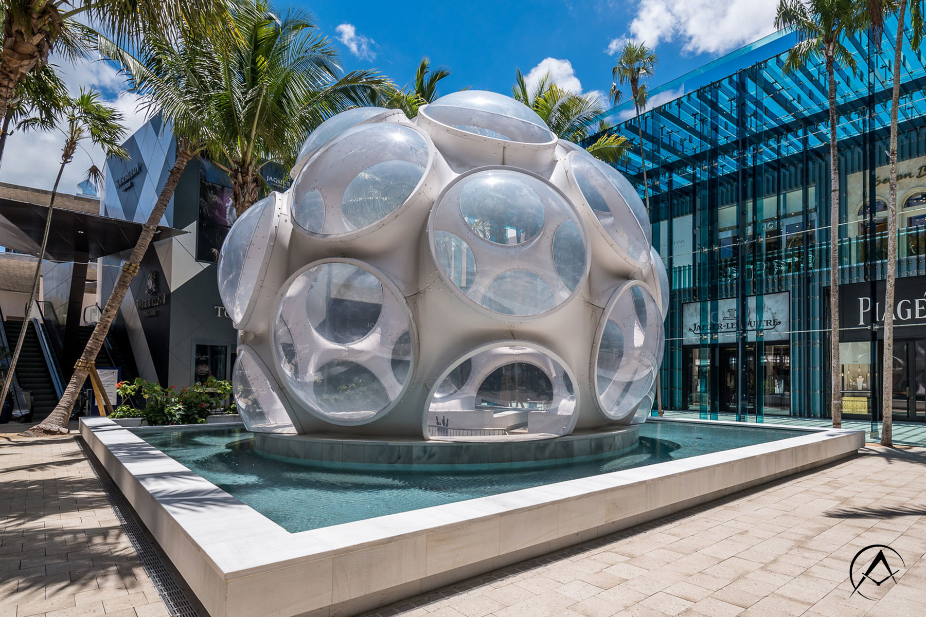 Miami Design District’s Fly’s Eye Dome Surrounded by Palm Trees and Store Fronts
