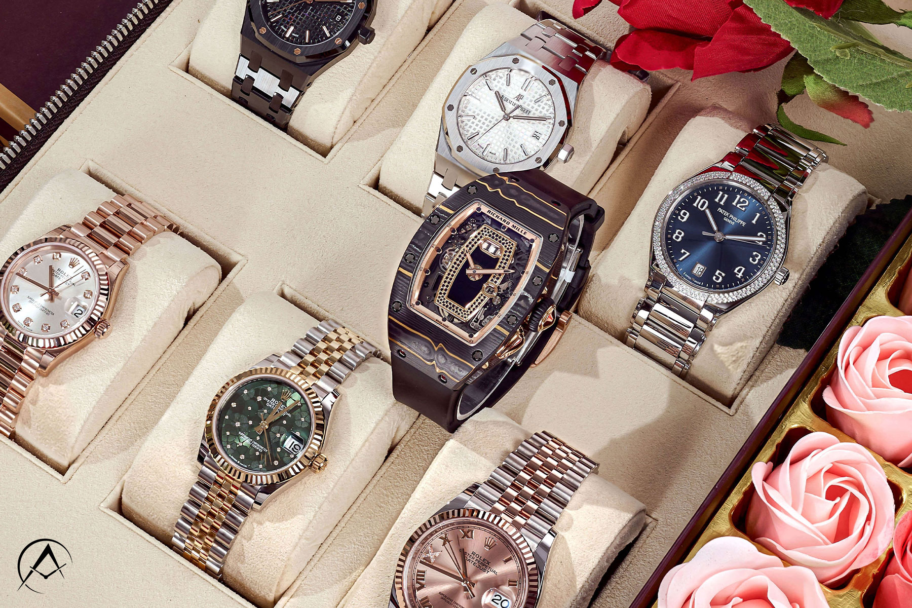 Watch Holder Displaying 7 Richard Mille, Rolex, Audemars Piguet, and Patek Philippe Luxury Timepieces Beside Pink and Red Roses
