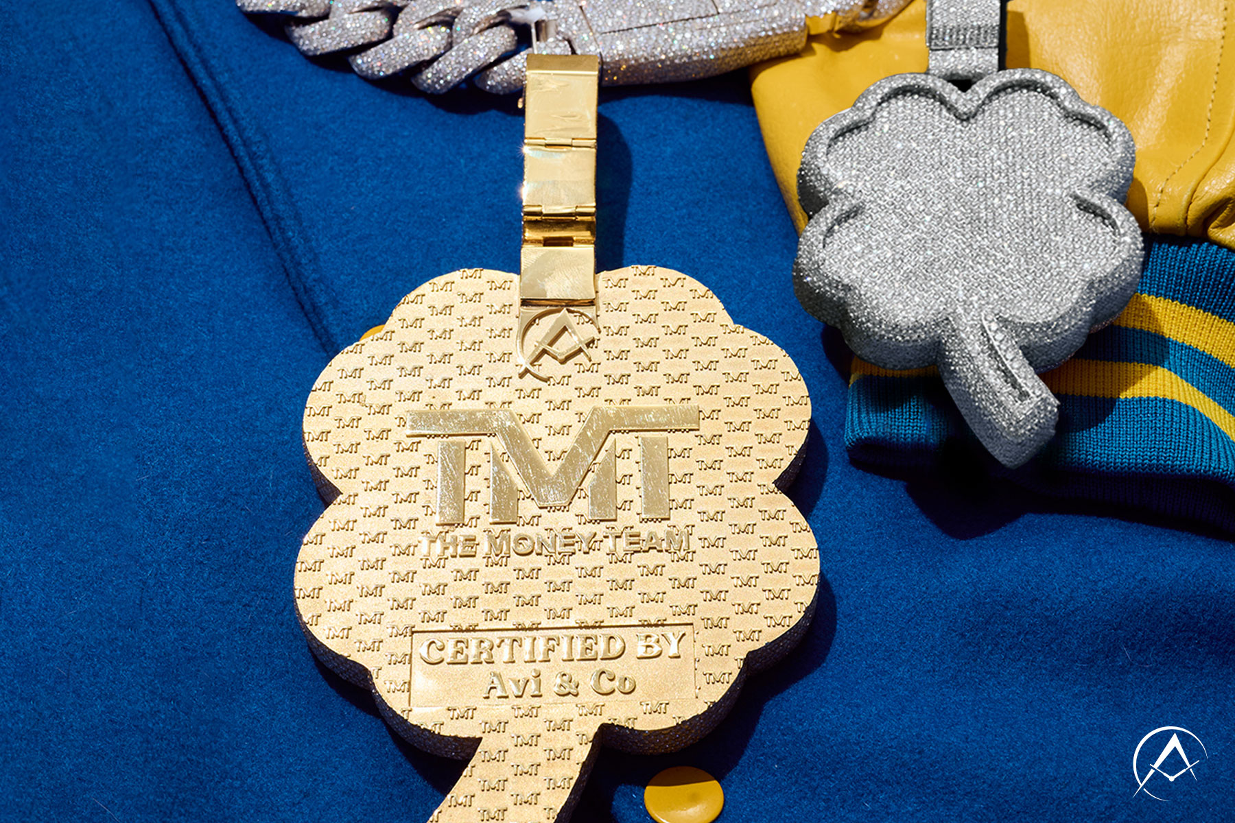 Avi & Co. Creates Custom Jewelry for Legendary Celebrities such as this Four-Leaf Clover Diamond-Pave Chain for Floyd Mayweather. The Money Team, Certified by Avi & Co. is Engraved on the Back.