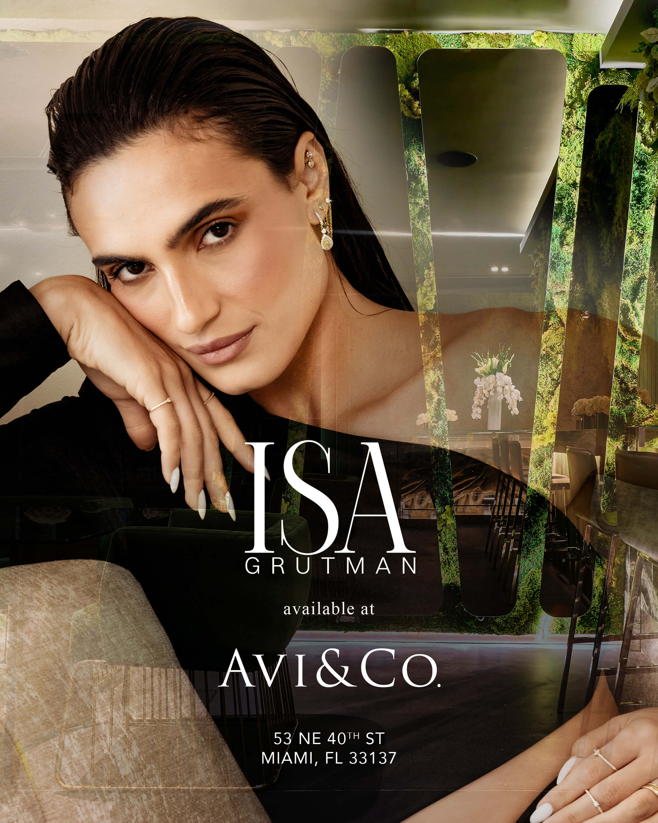 Model and Entrepreneur Isa Grutman Posing in Front of Avi & Co.'s Miami Showroom, Announcing the Start of their Jewelry Partnership.
