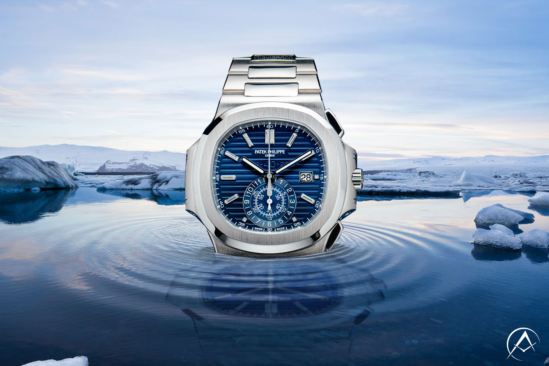 18K White Gold 44 mm Patek Philippe Nautilus with Blue Dial, Index Hour Markers, Date Function, and Chronograph Function.
