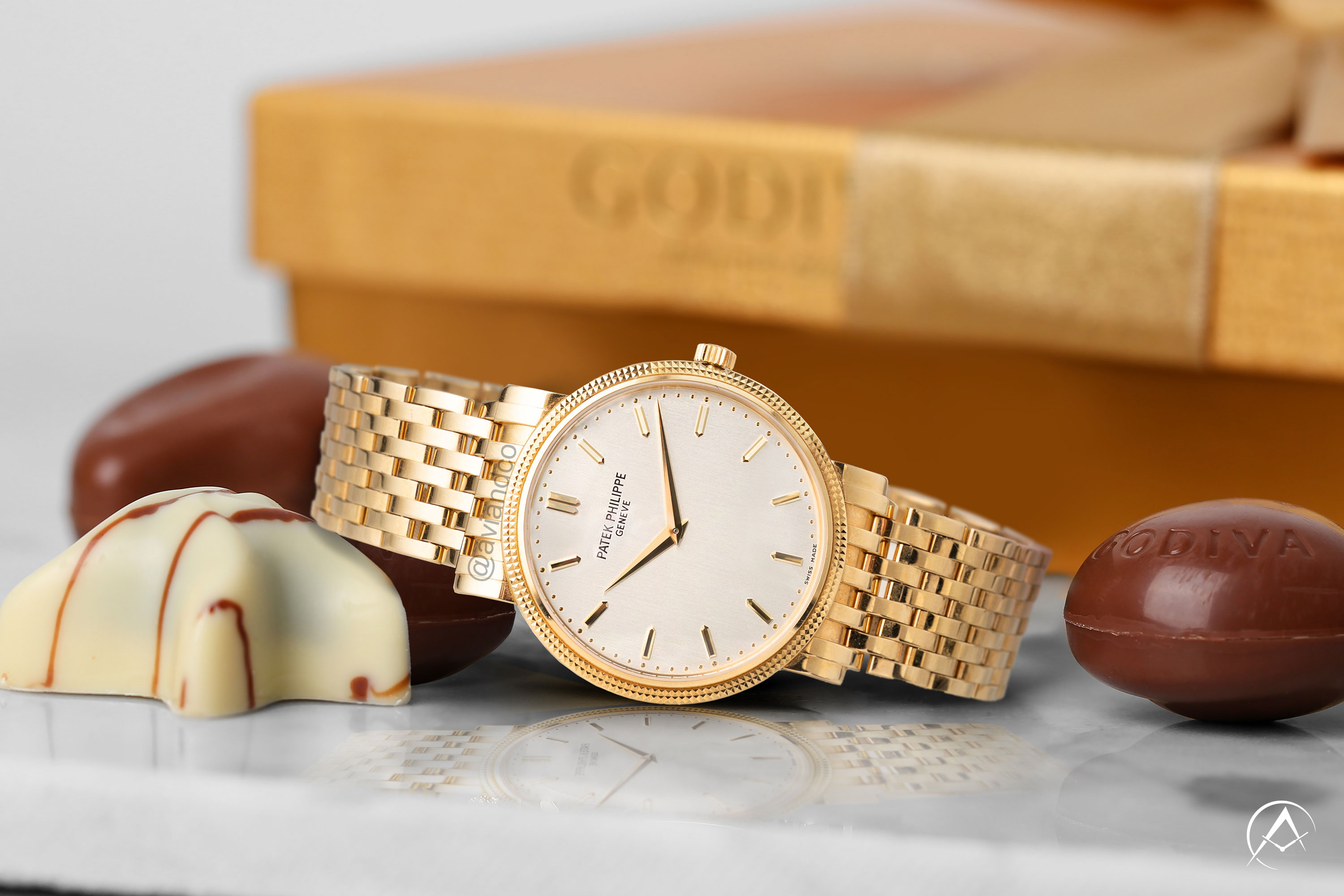 Patek Philippe Calatrava gold on Godiva chocolate background