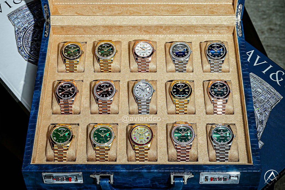 Collection of Rolex watches in watch box