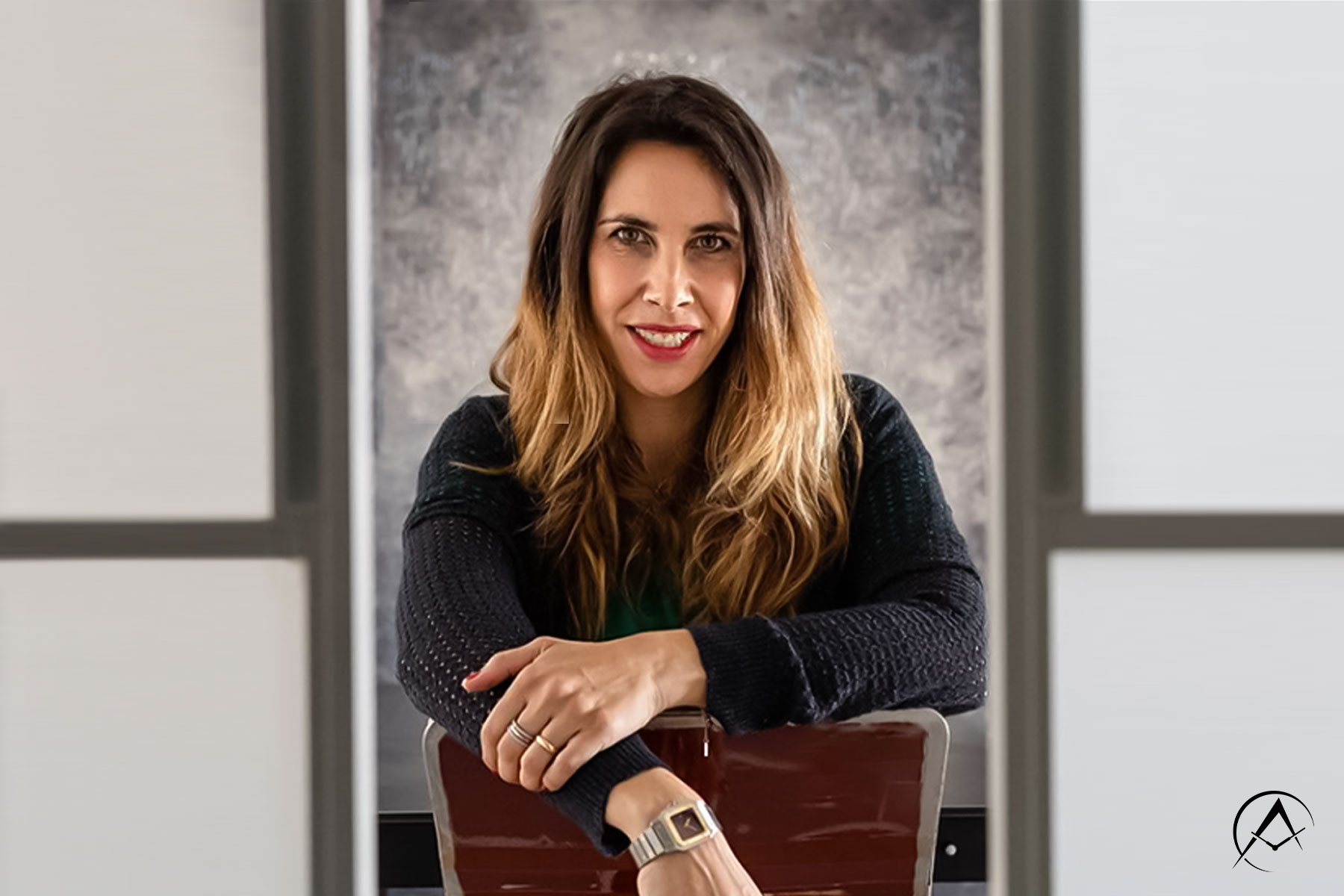 Luxury Watch Expert and Rolex Author, Giorgia Mondani Posing on a Chair