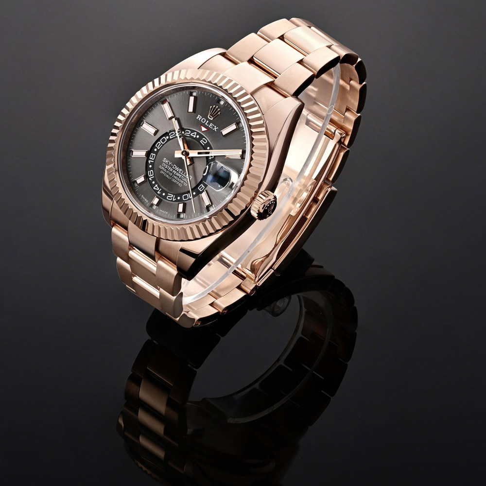 18K Rose Gold 42 mm Case with Chocolate Dial, Index Hour Markers, Date Function, and GMT Function.