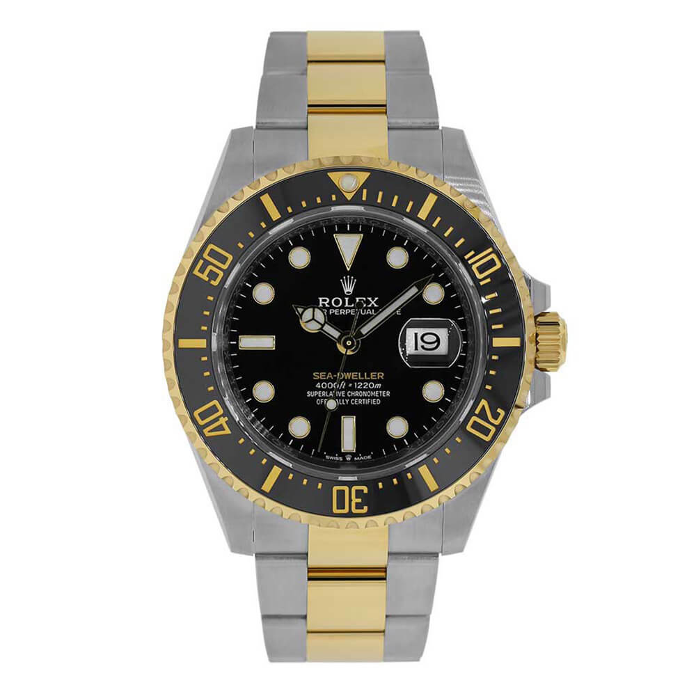 Black Bezel and Black Dial Timepiece with Two-Tone Bracelet on a White Background.