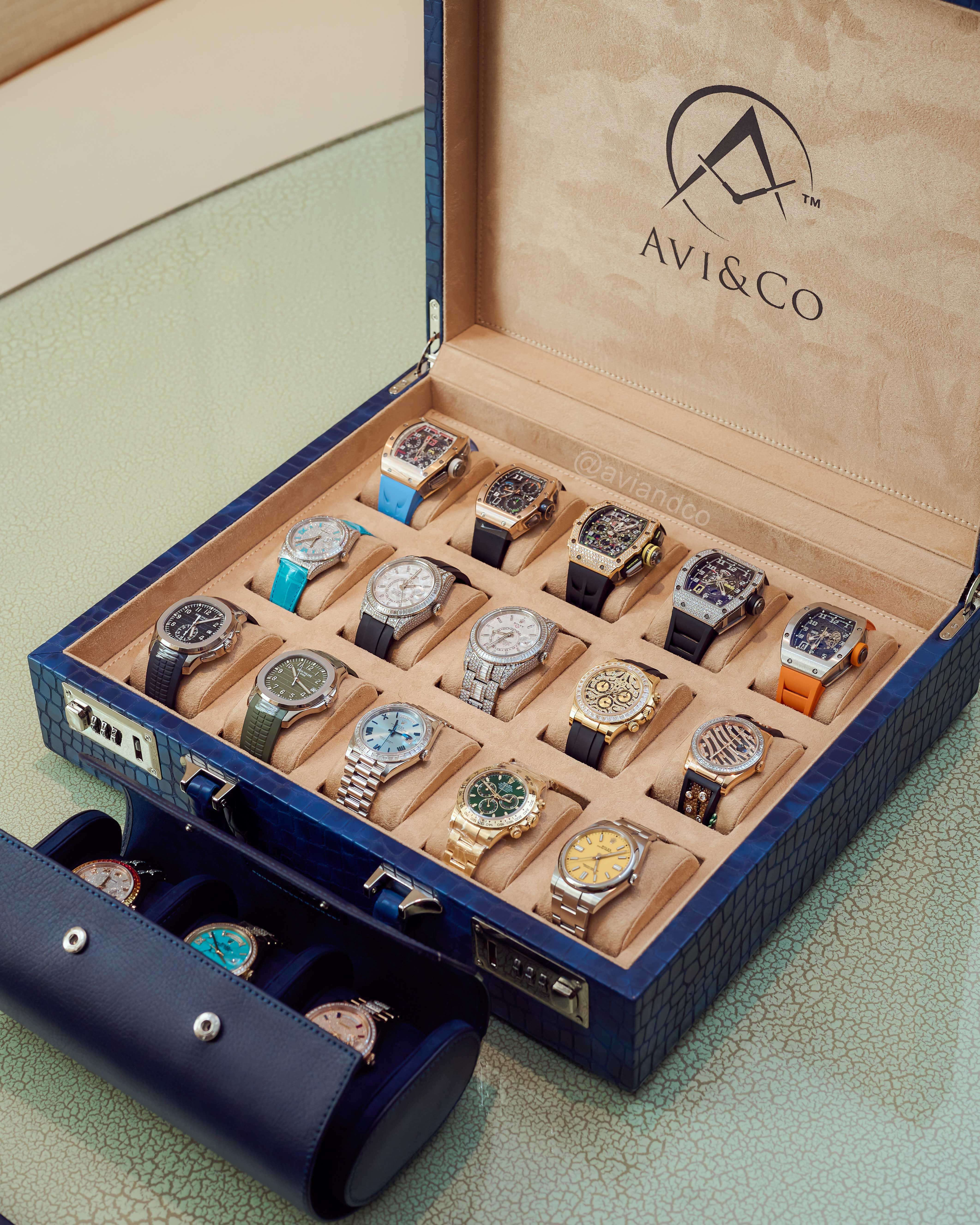 Leather Navy Box with 15 Rare Watches Including Richard Mille, Rolex, and Patek Philippe.