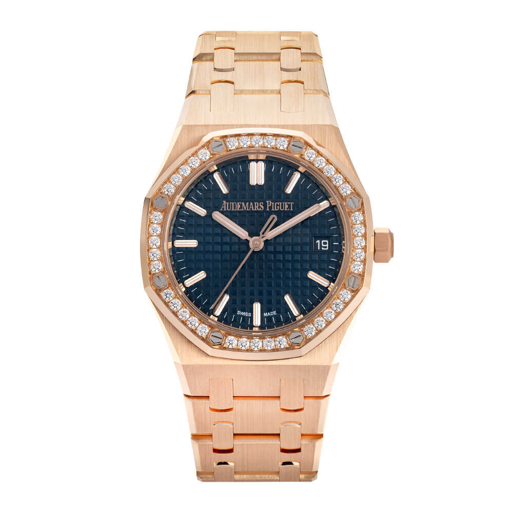 Audemars Piguet Royal Oak Watch from Avi & Co.’s Holiday Gift Guide with 18K Rose Gold 34 mm Case, Diamond Bezel, Bleu Nuit Nuage 50 Index Dial, and Date Function.