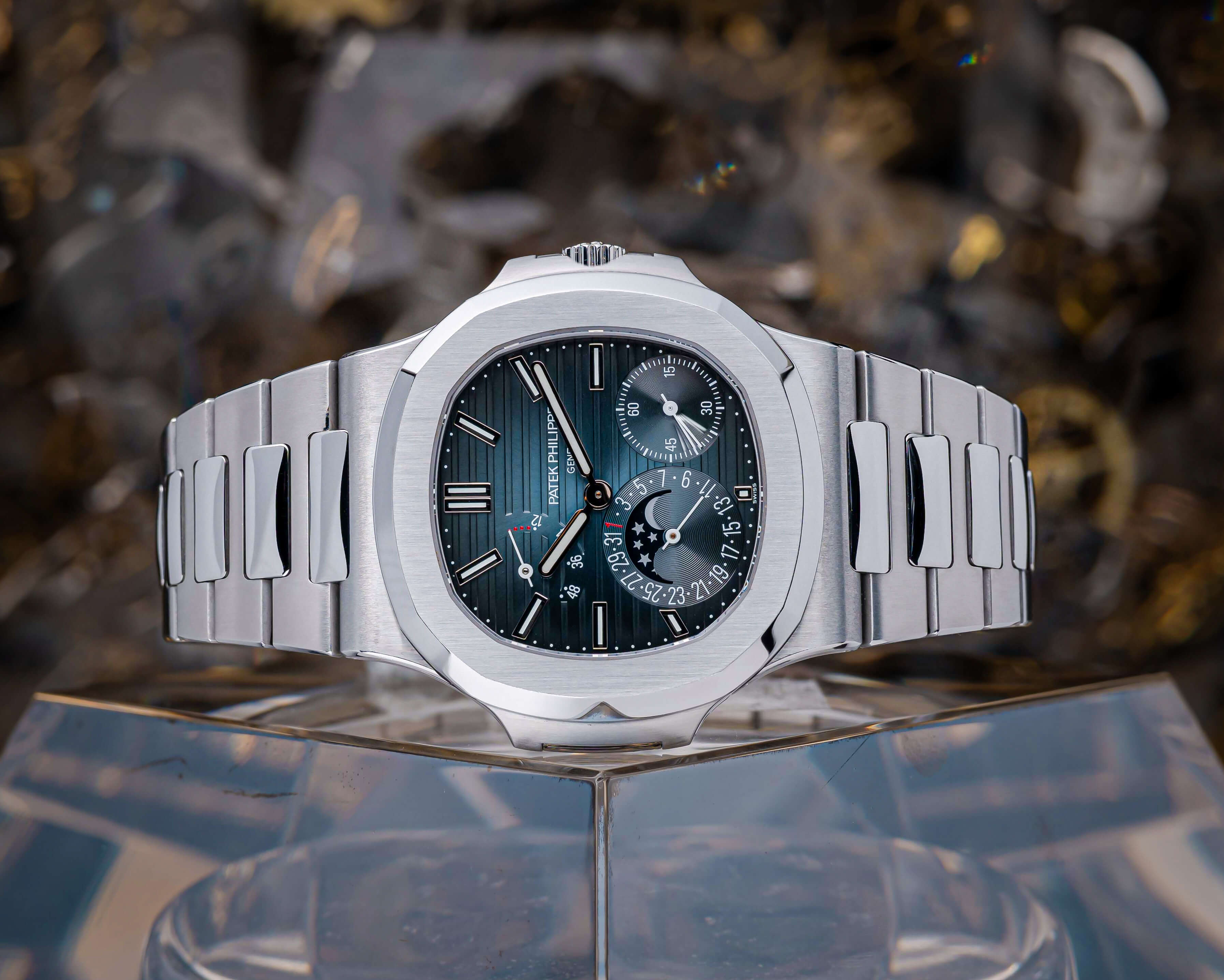 Patek Philippe Nautilus with Blue Index Dial, 40 mm Case Size, and Moonphase Function.