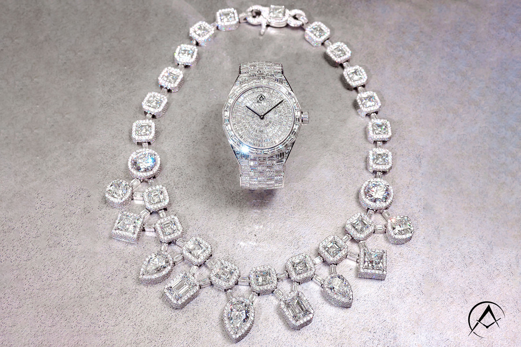 Legendary Celebrities such as Bad Bunny and Rick Ross have Worn this Diamond-Pave Chain, Which Lays Beside a Limited Edition Avi & Co. Diamond-Pave Timepiece.