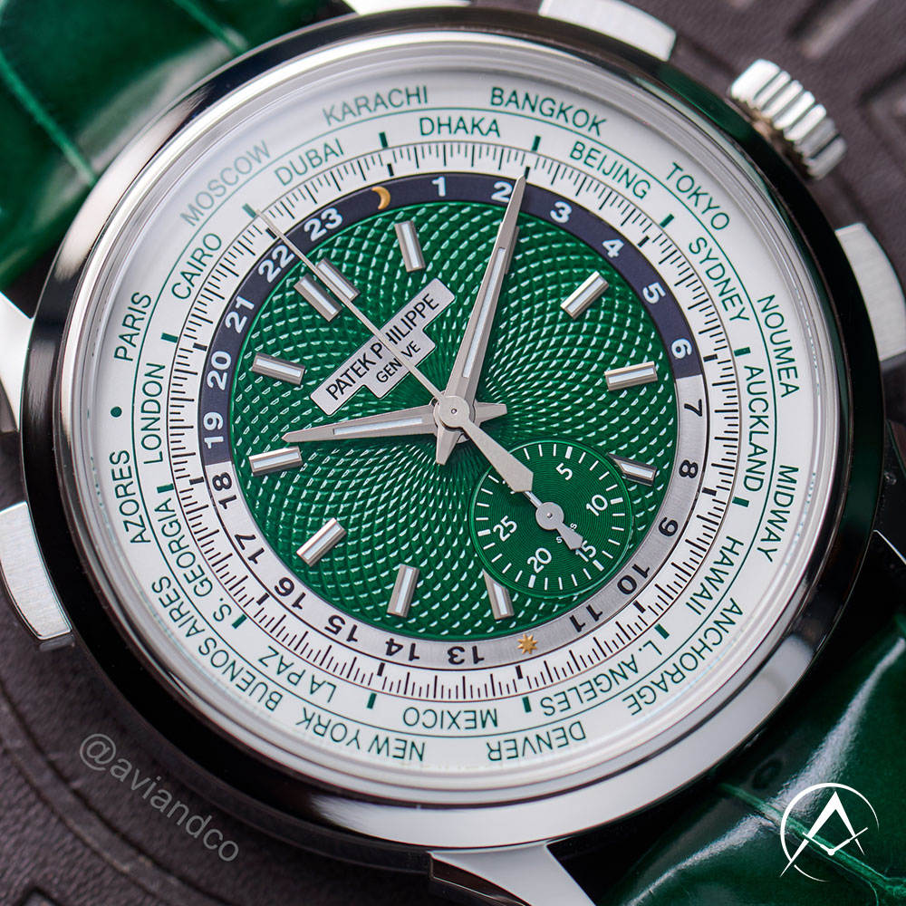 Close-up of Platinum 40 mm Patek Philippe Luxury Watch with Green Leather Strap.
