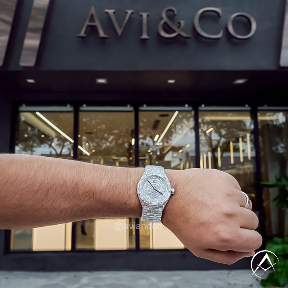 Diamond-Pave Timepiece with 120.55 Carrots and an Automatic Movement on a Man’s Wrist Overlooking Avi & Co.’s Miami Boutique Storefront.