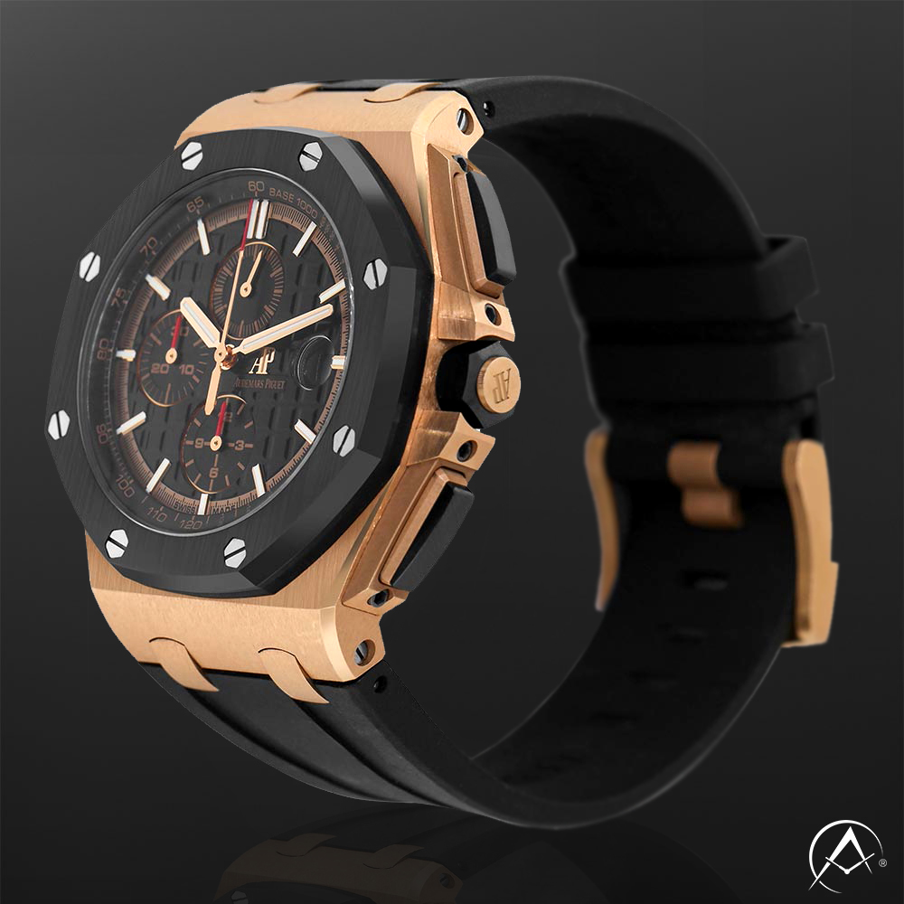 Rose Gold Timepiece with Black Rubber Strap Displayed on a C-Ring on a Black Background.