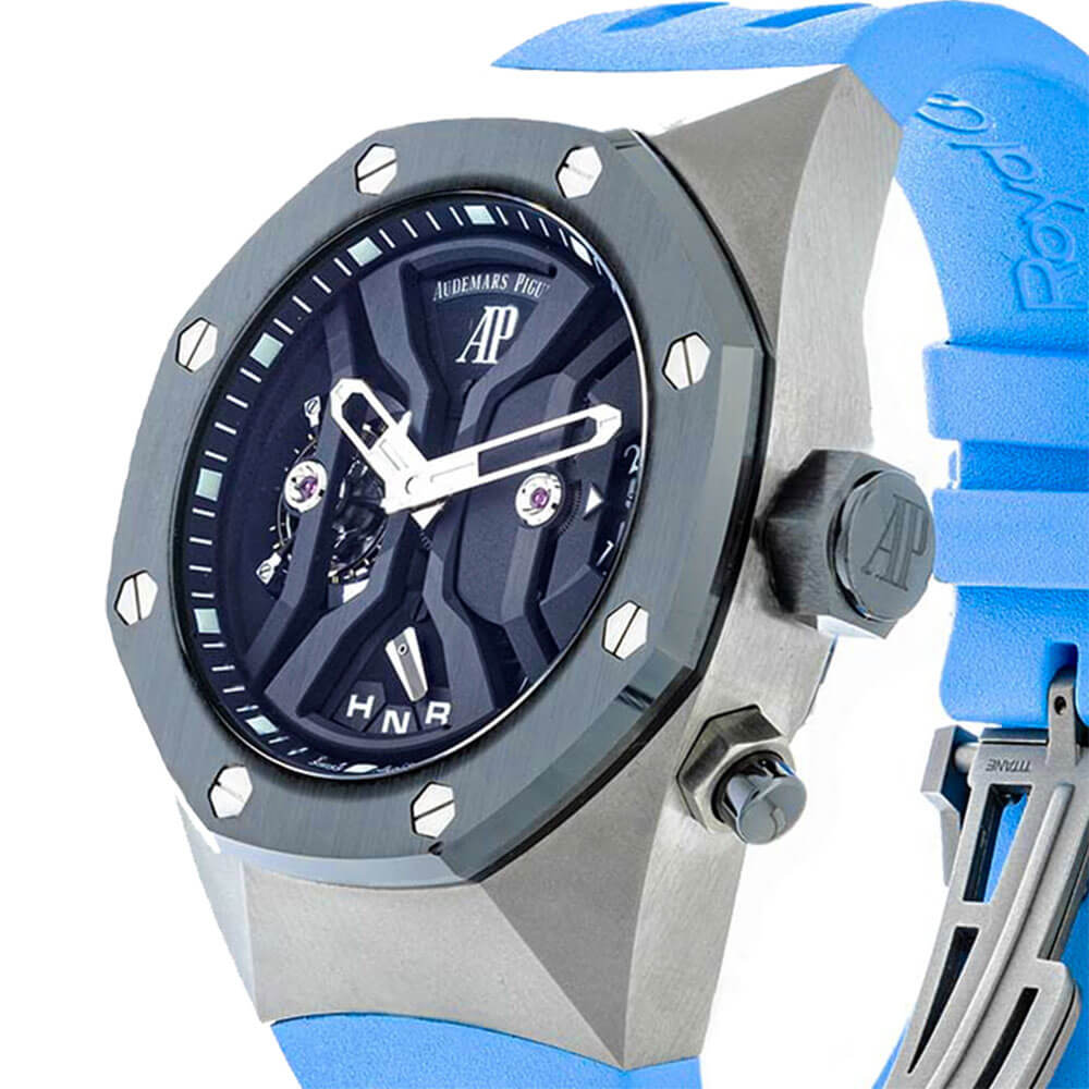 Titanium 44 mm Case with Black Dial, Index Hour Markers, and a GMT Tourbillon Function.