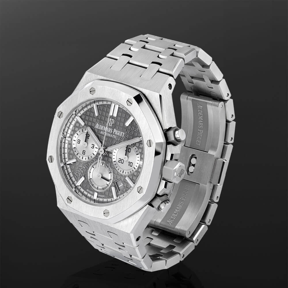 Stainless Steel Audemars Piguet Royal Oak with Stainless Steel Bracelet Displayed on a C-Ring with a Black Background.