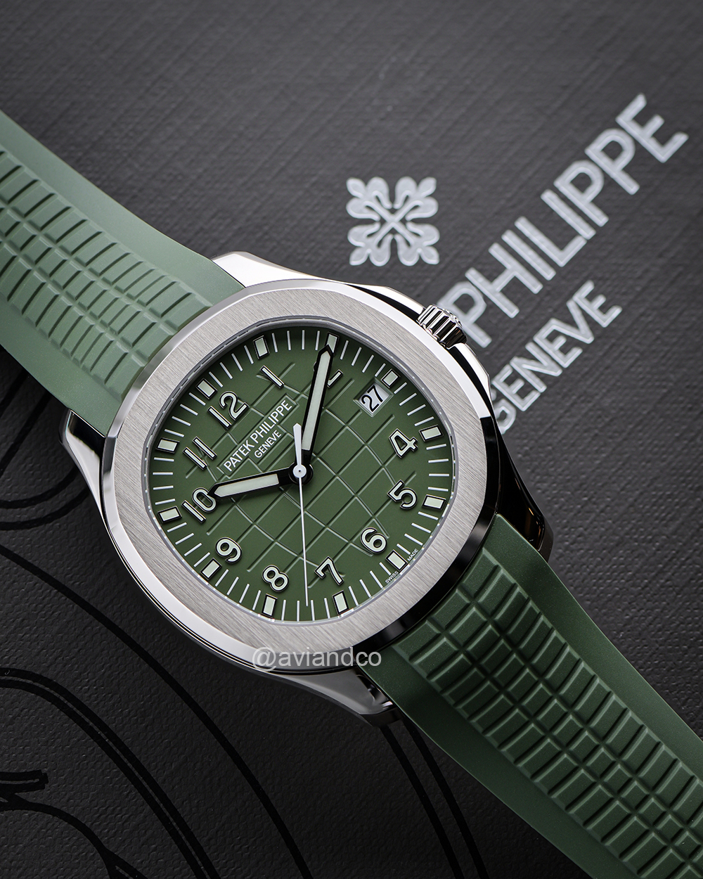 Patek Philippe Aquanaut, 18K White Gold, Green Arabic Dial, 42 mm