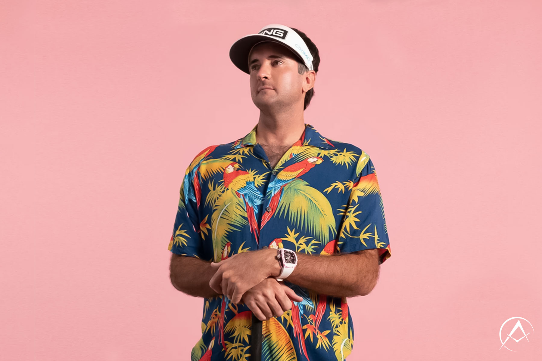 Man Wearing Richard Mille Timepiece, Colorful Top, and White Viser on a Pink Background. Photo Courtesy of Richard Mille’s Instagram.