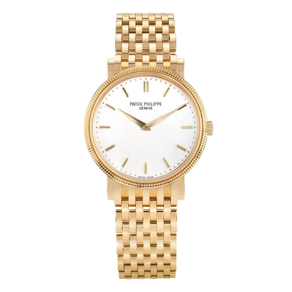 Patek Philippe Watch with Yellow Gold 35 mm Case, Silver Dial, and Index Hour Markers.
