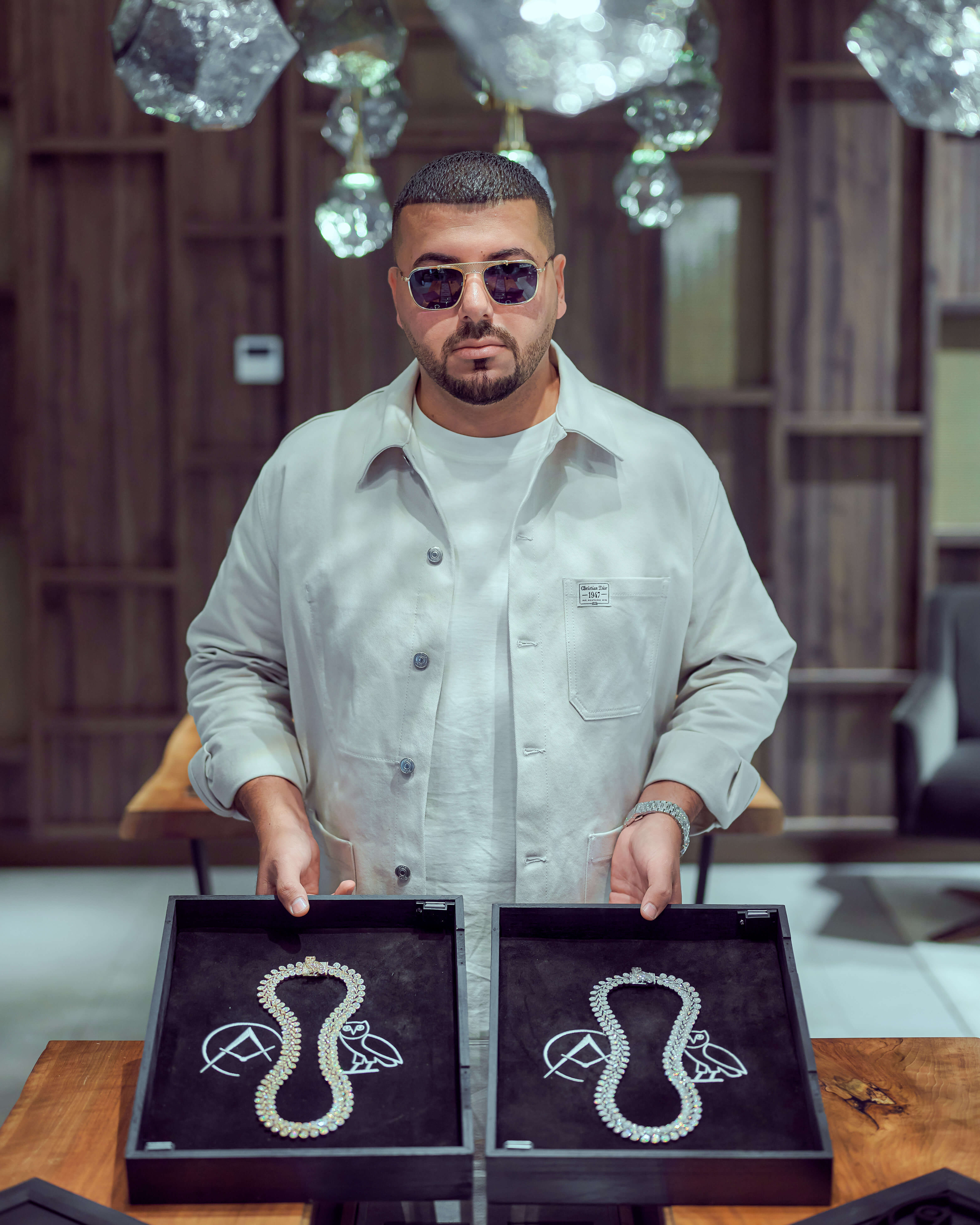 Avi Hiaeve Displaying Drake’s Owl-inspired Custom Chains, Which Represent the Rapper’s Logo OVO (October’s Very Own).