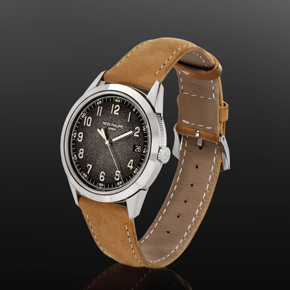 40 mm White Gold Watch with Arabic Numerals, Black Dial, Leather Strap, and Date Function.