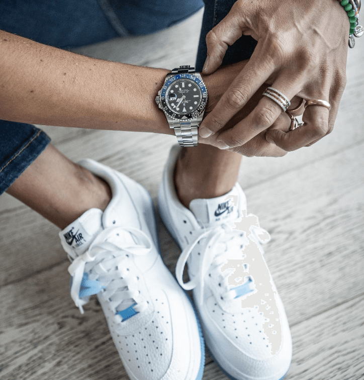 Woman Wearing a Blue and Black Rolex GMT-Master II Batman and White Nike Air Sneakers.