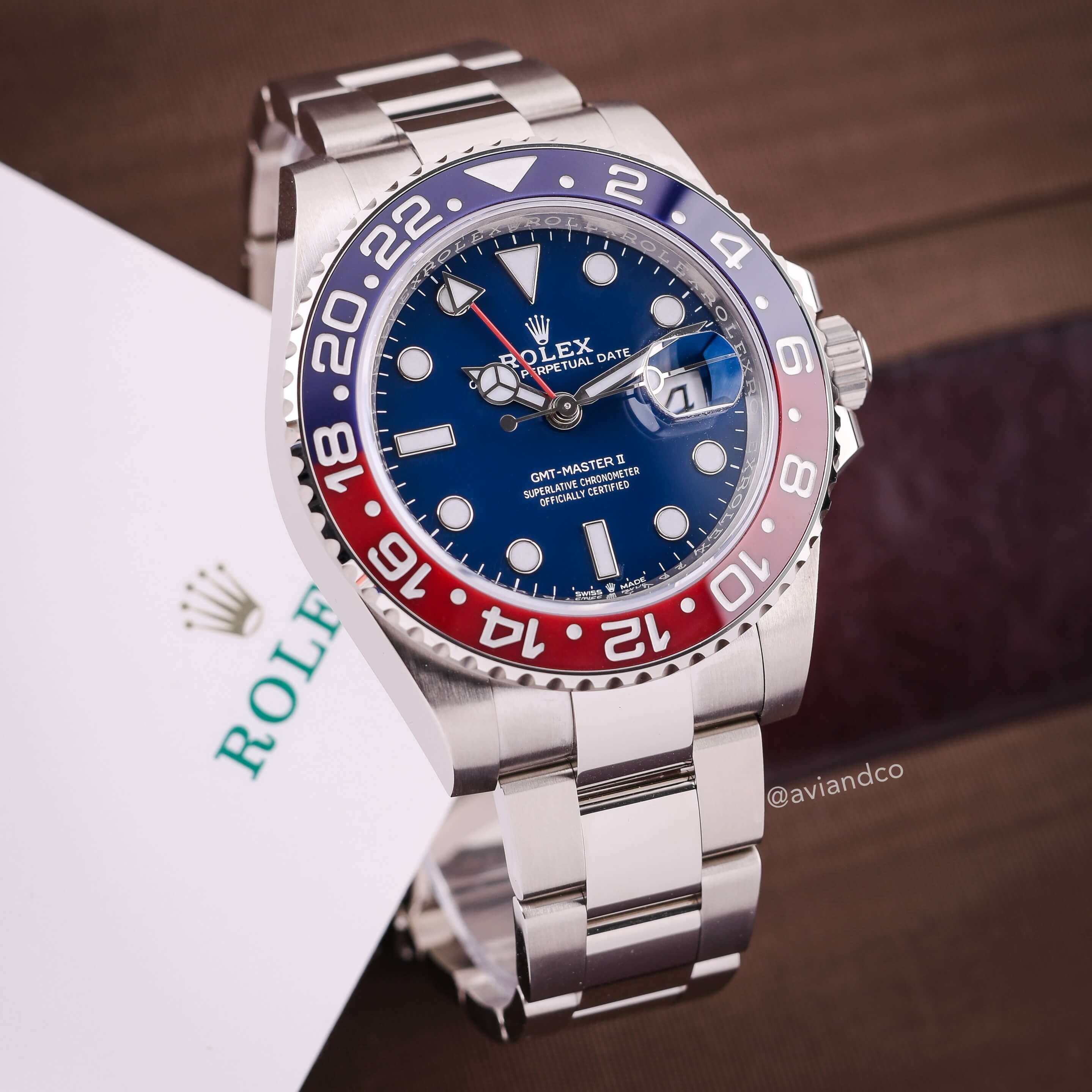 18K White Gold Rolex GMT-Master II with 40 mm Case Size, Pepsi Bezel, and Oyster Bracelet.