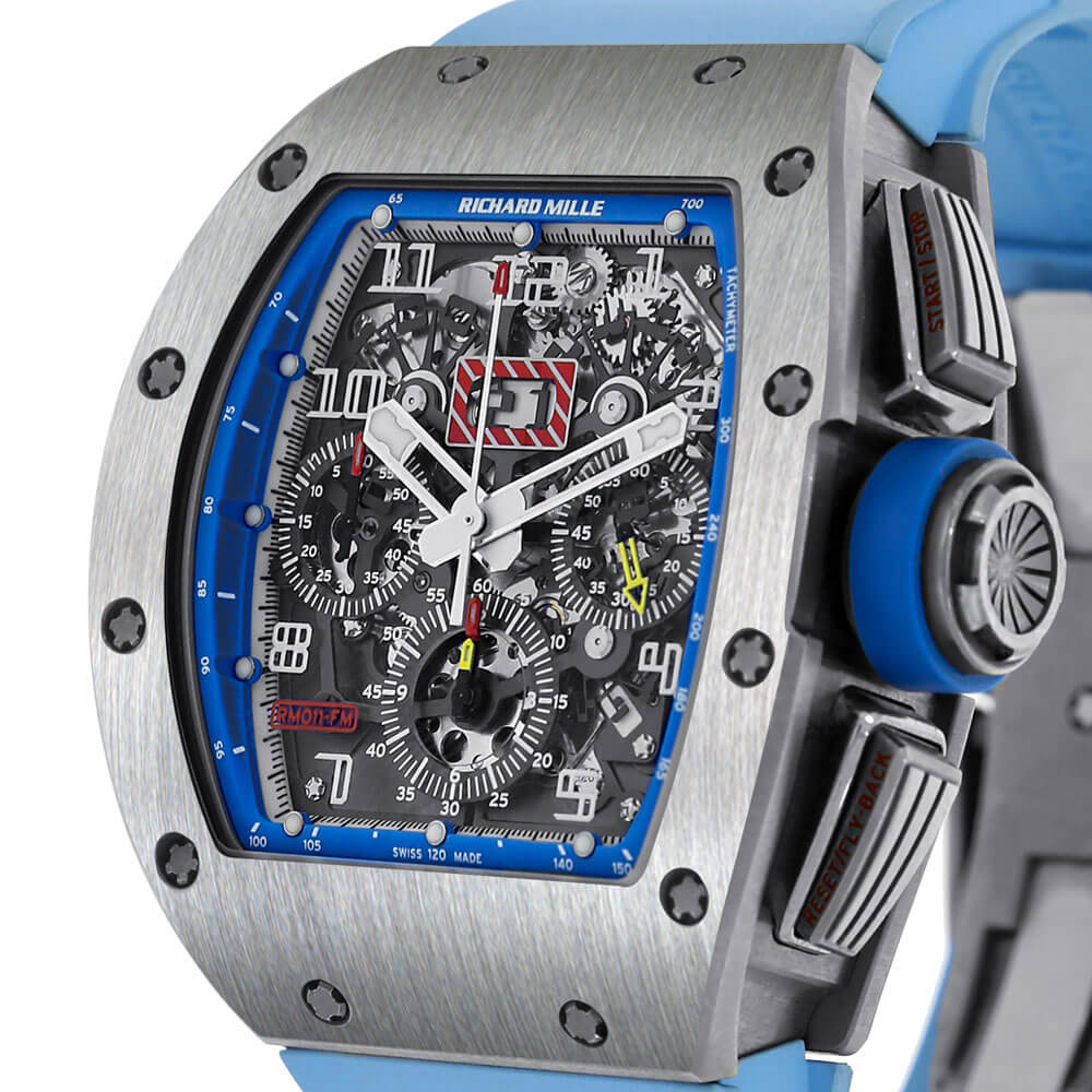 Richard Mille x Felipe Massa RM 011 Close-up of Openworked Timepiece with Light Blue Rubber Bracelet Displayed on a C-ring on a White Background.