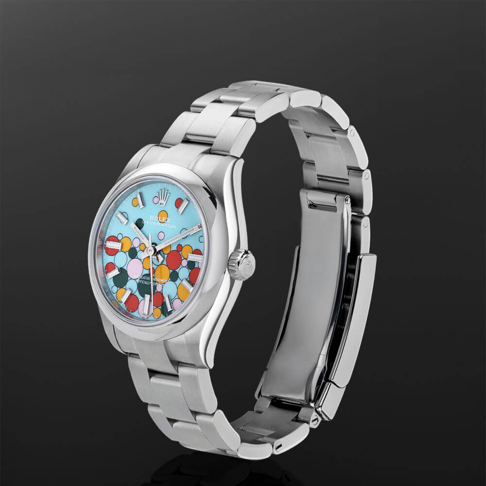 Stainless Steel Rolex ‘Celebration’ Oyster Perpetual Displayed on a C-Ring with a Black Background.