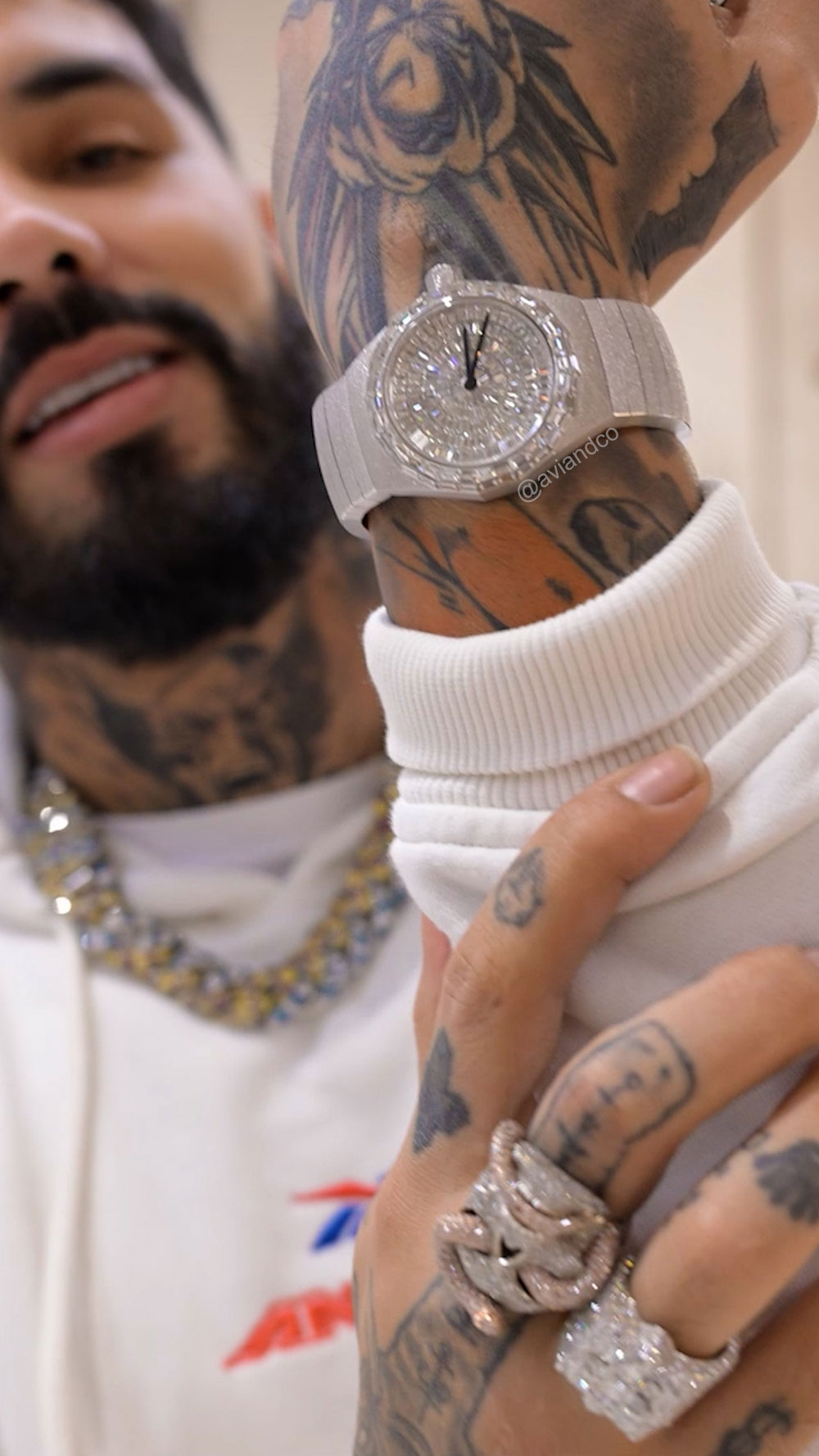 Anuel tries on luxury watches at Avi & Co. Miami