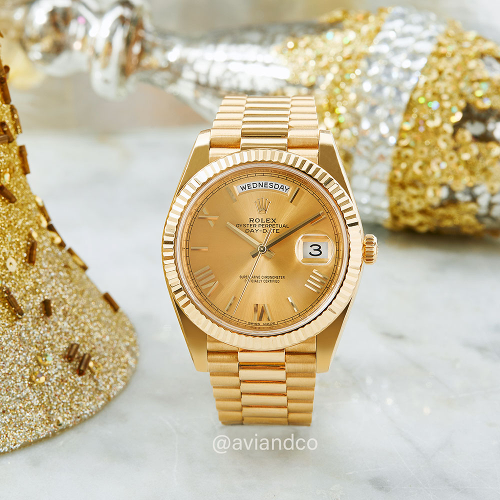 Rolex Day-Date 40, 18K yellow gold, champagne Roman numeral dial