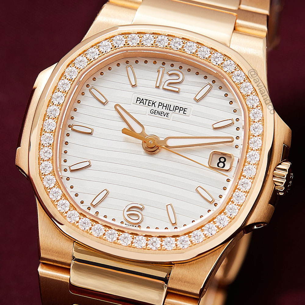 Patek Philippe Nautilus, 18K rose gold, diamond bezel, silver dial, 35 mm