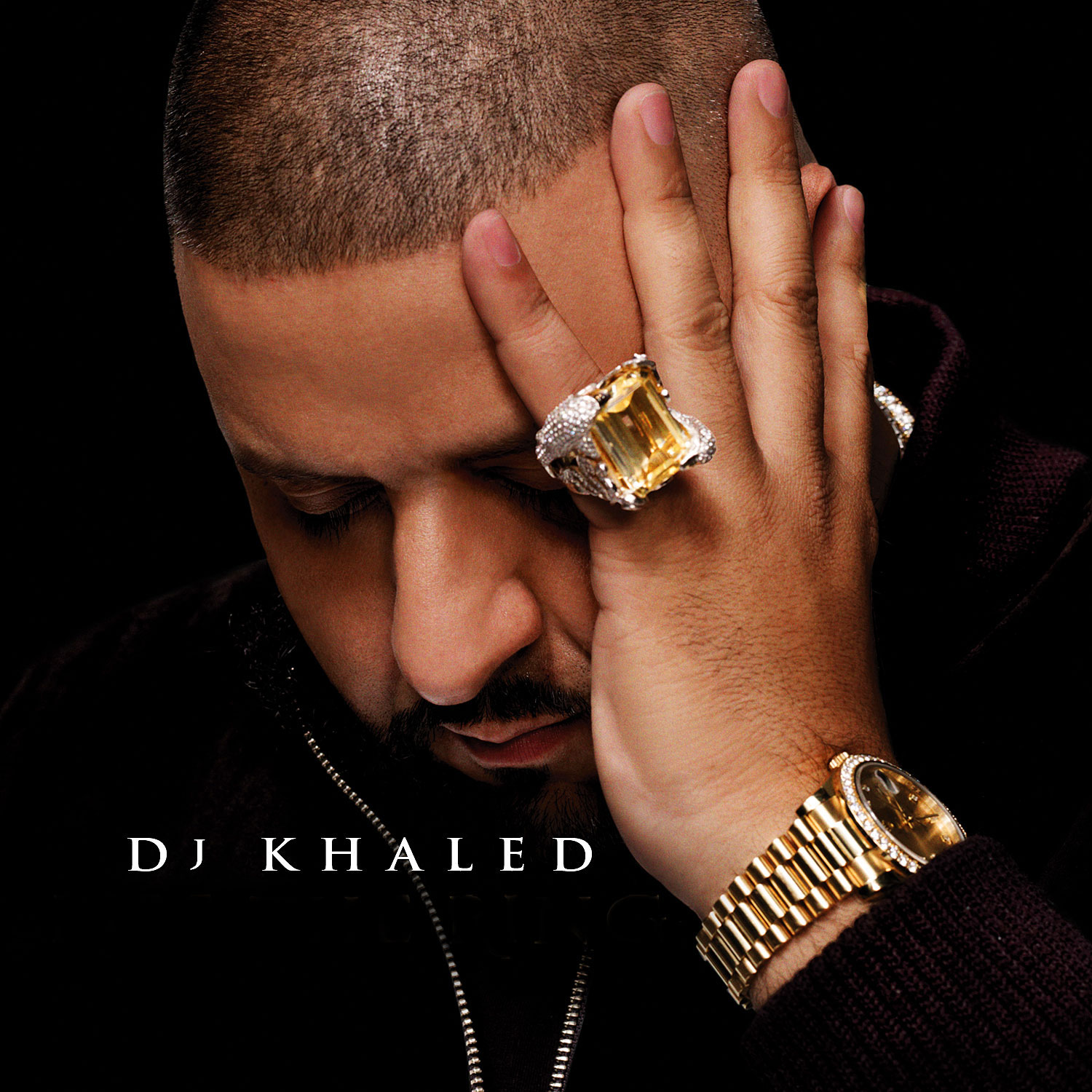 DJ Khaled wears diamond-studded Rolex (Image via Rolex Magazine)