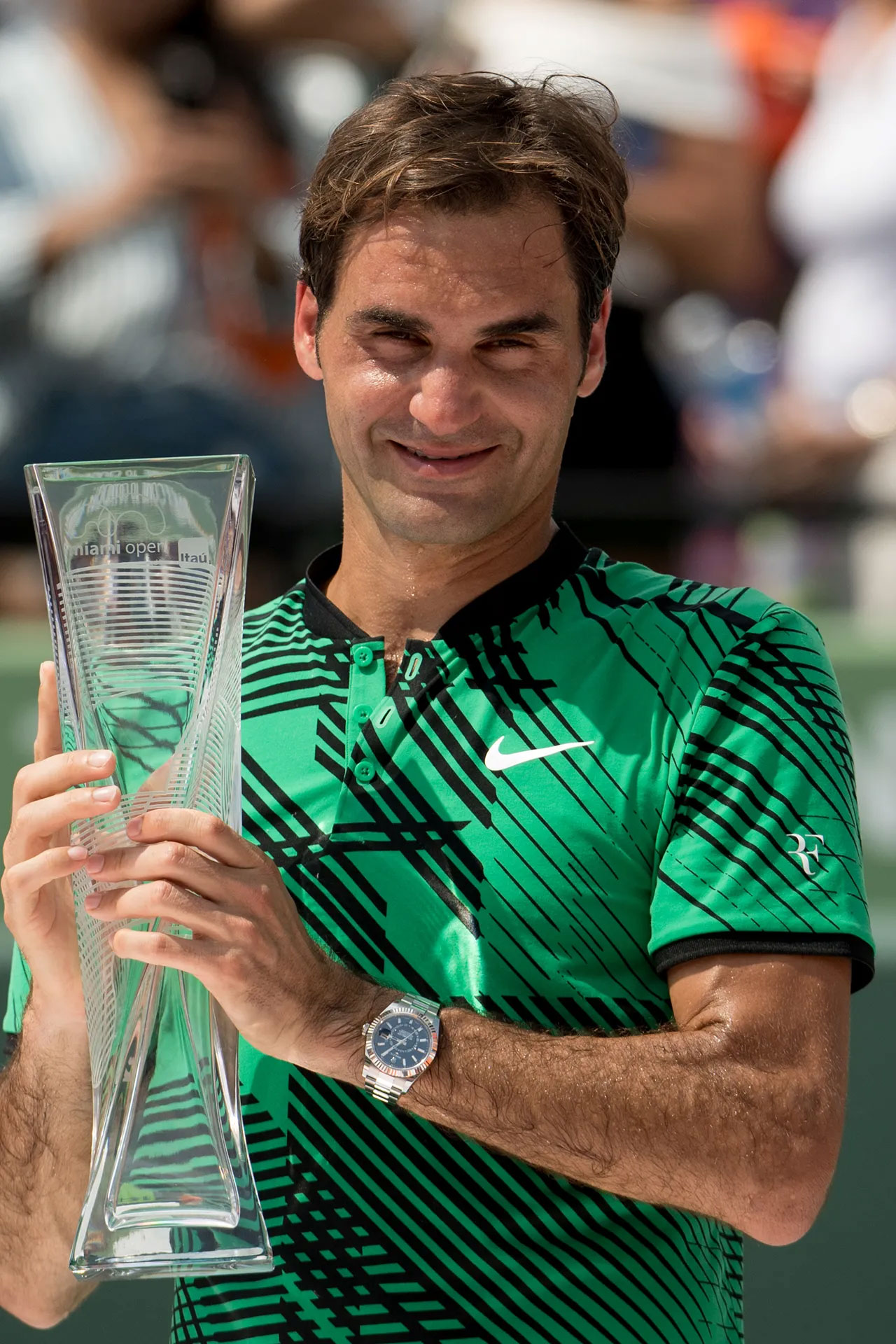 Roger Federer wearing a Rolex Datejust watch