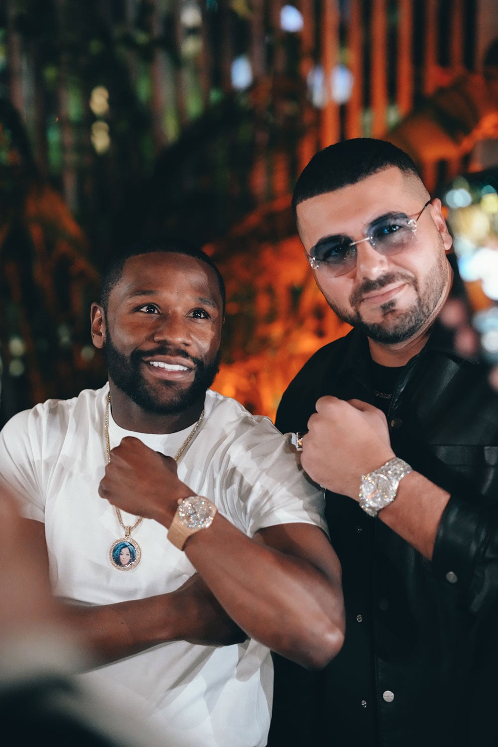 Floyd Mayweather and Avi Hiaeve wearing Avi & Co. watches