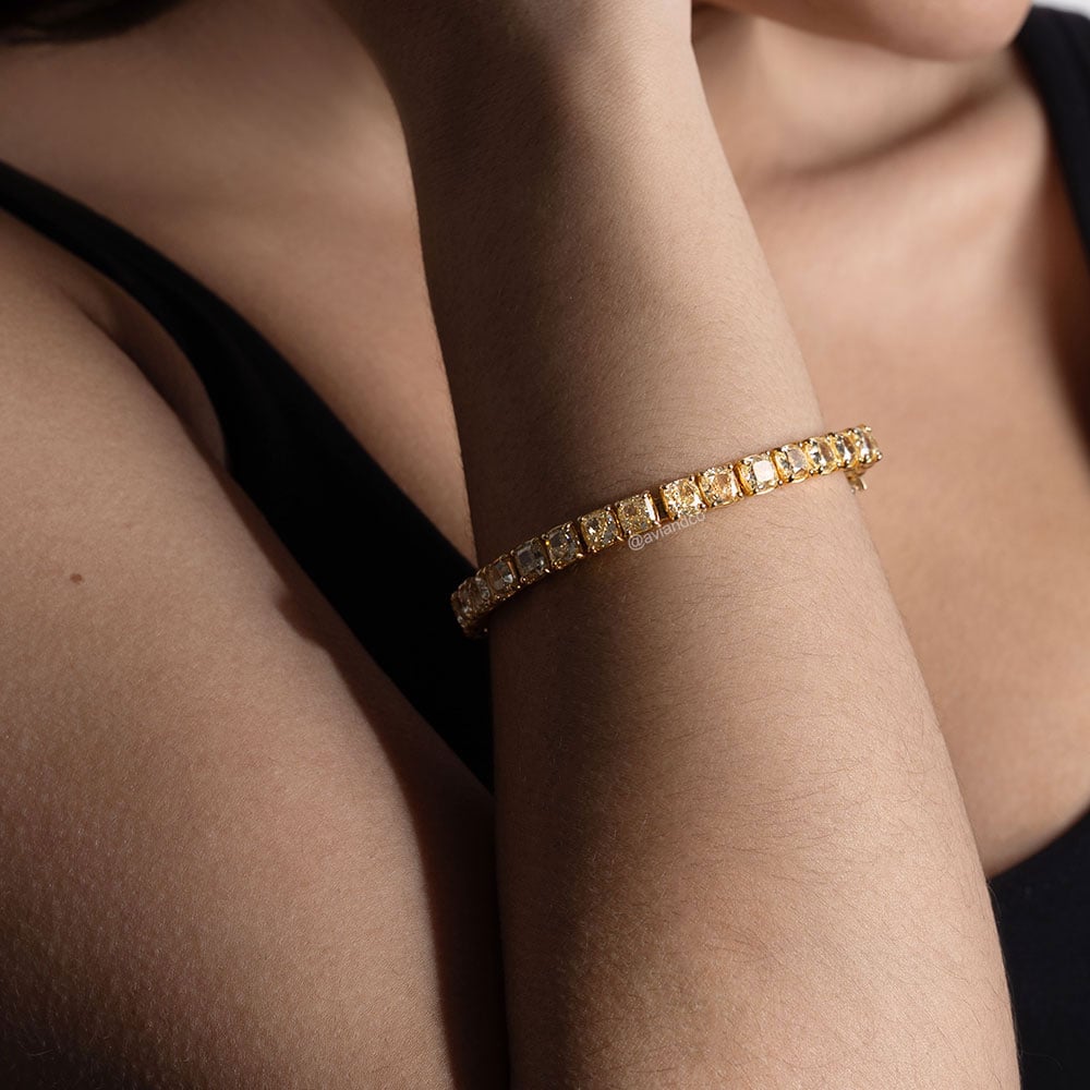 Diamonds by Avi & Co. 18K Yellow Gold Fancy Yellow Cushion Cut Line Bracelet, 32.73 CT