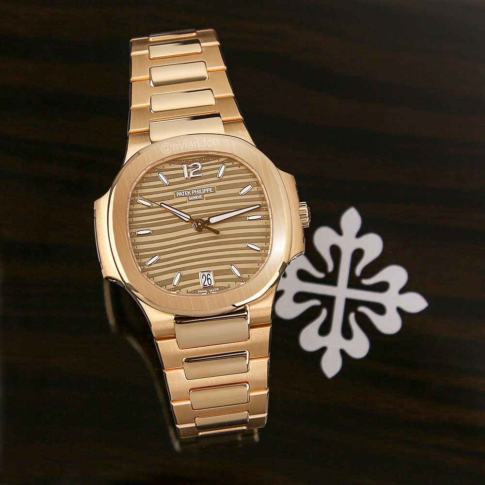 Patek Philippe Nautilus, 18K rose gold, gold opaline dial, 35 mm