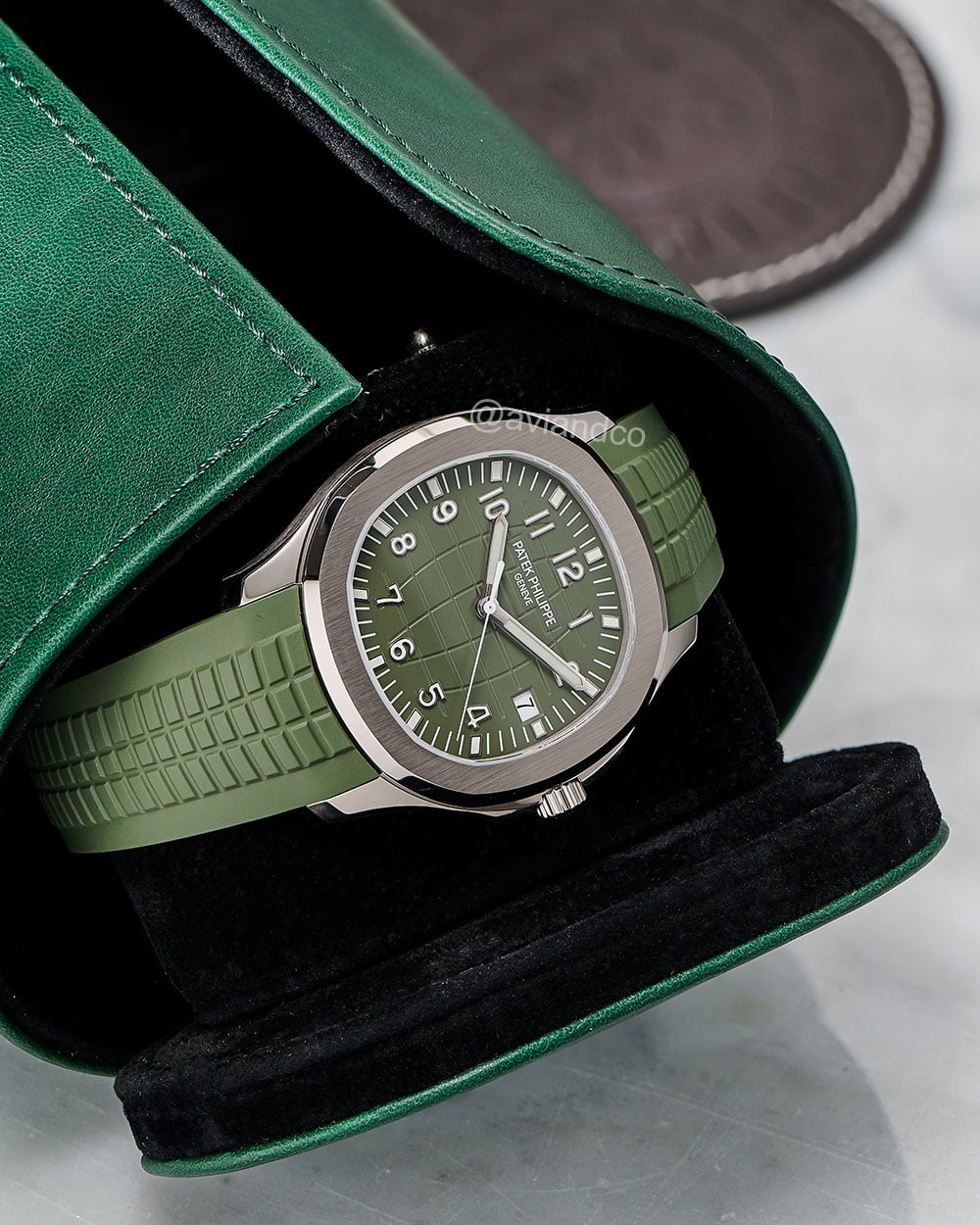 Patek Philippe Aquanaut, 18K white gold, green Arabic dial, 42 mm