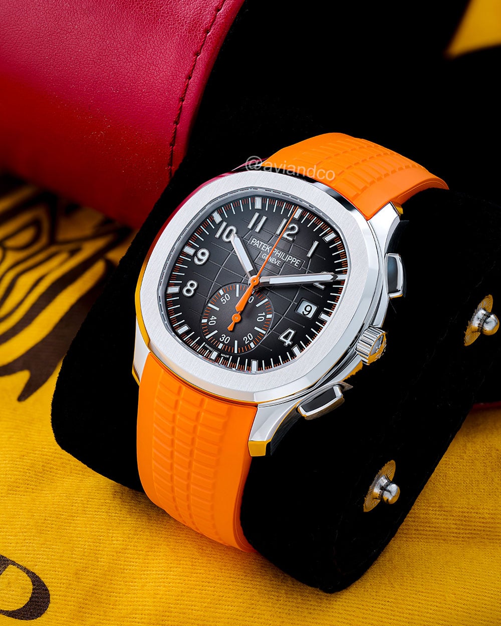 Patek Philippe Aquanaut, Stainless Steel, Black Arabic Dial, Orange Strap