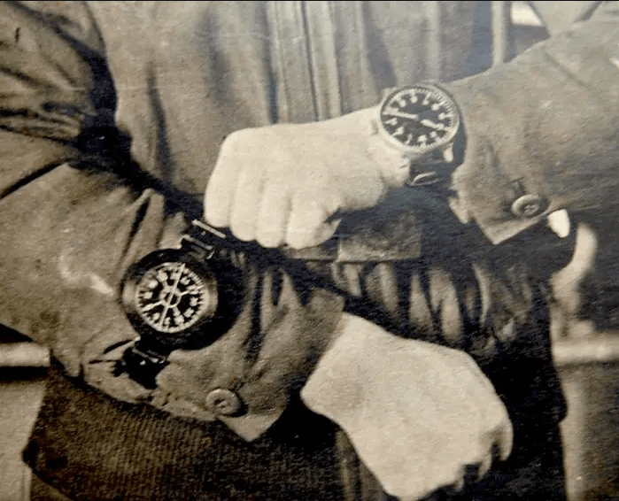 Military Veteran Wearing Two Trench Watches on Each Wrist in an Antique Photograph.
