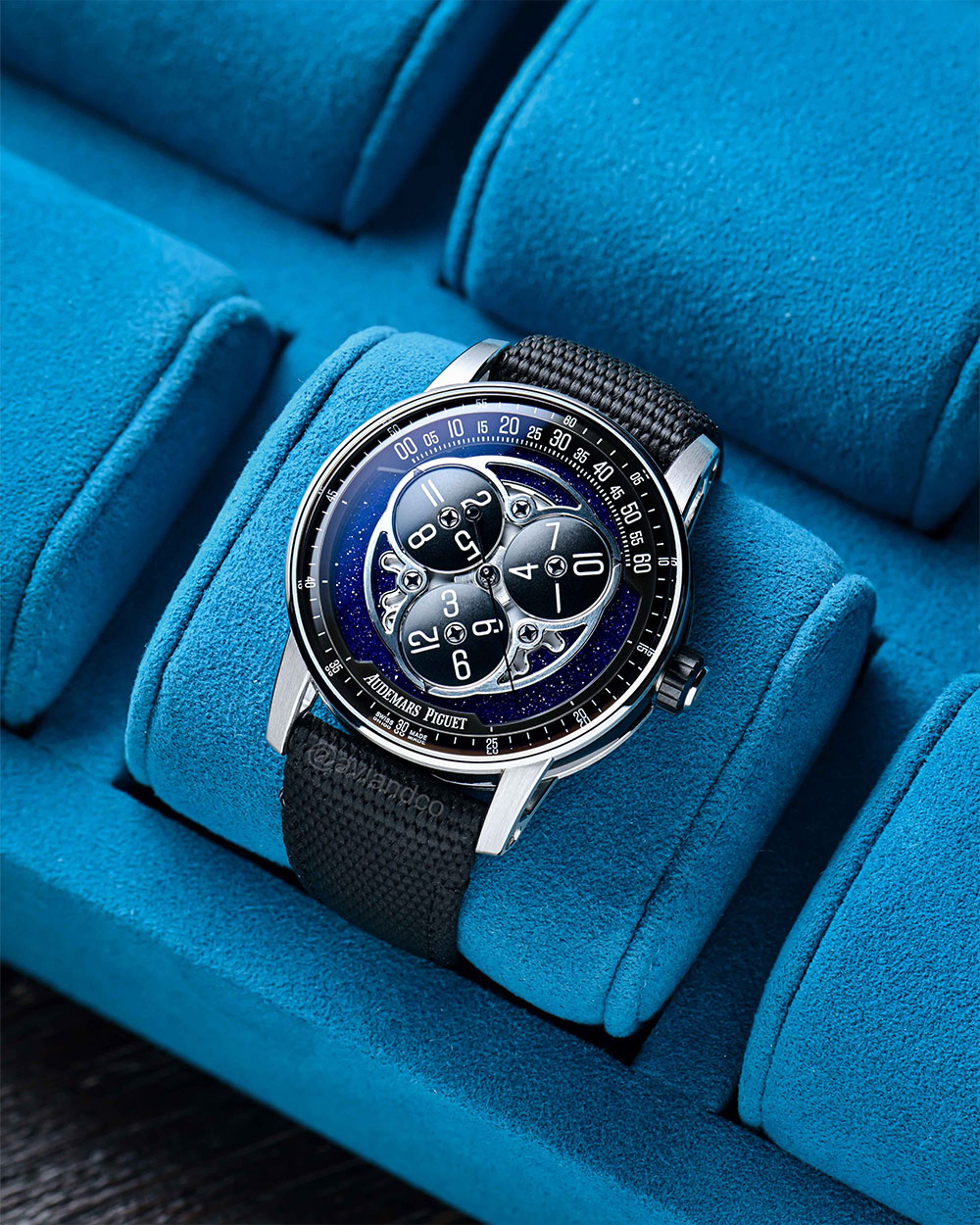 Audemars Piguet Code 11.59 15212NB model with black fabric strap and blue/black face