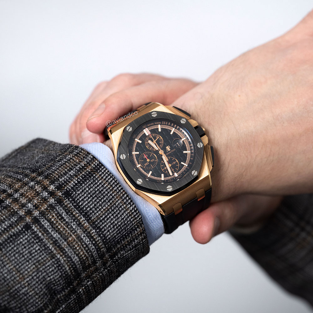 18K Rose Gold Luxury Timepiece with 42 mm Case Size, Gold Arabic Dial, and Date Function Displayed on a Man’s Wrist.