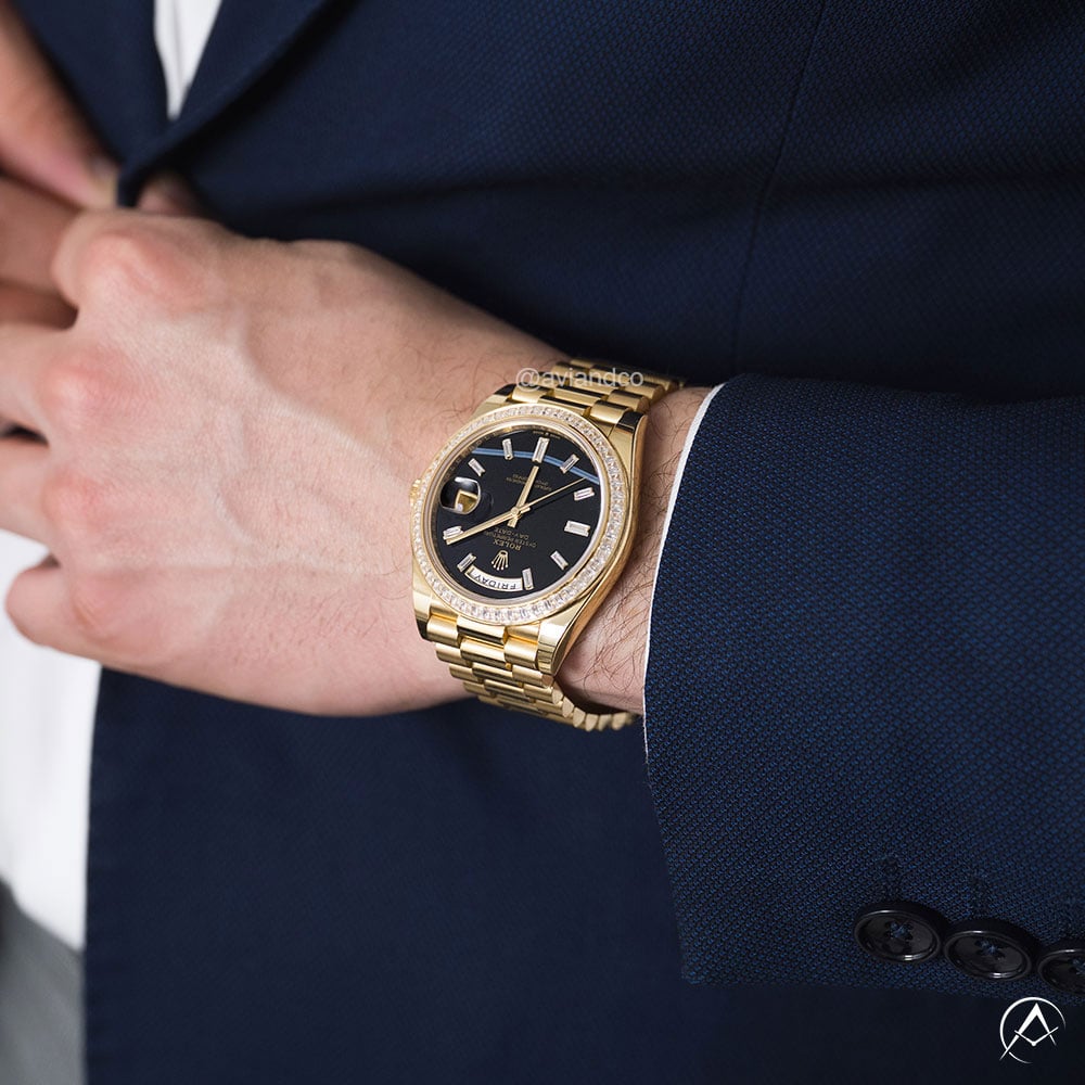 Rolex Day-Date 40 in 18K Yellow Gold, black index Dial, 40 mm face