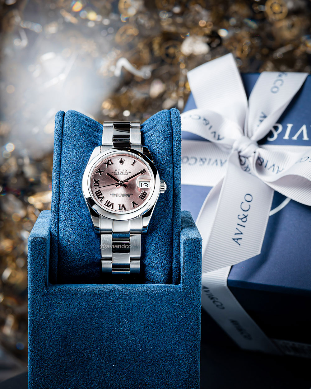 Rolex Lady-Datejust Luxury Timepiece with 31 mm Stainless Steel Case, pink Roman Dial, and Date Window.