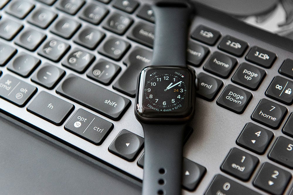 Apple watch on computer keyboard