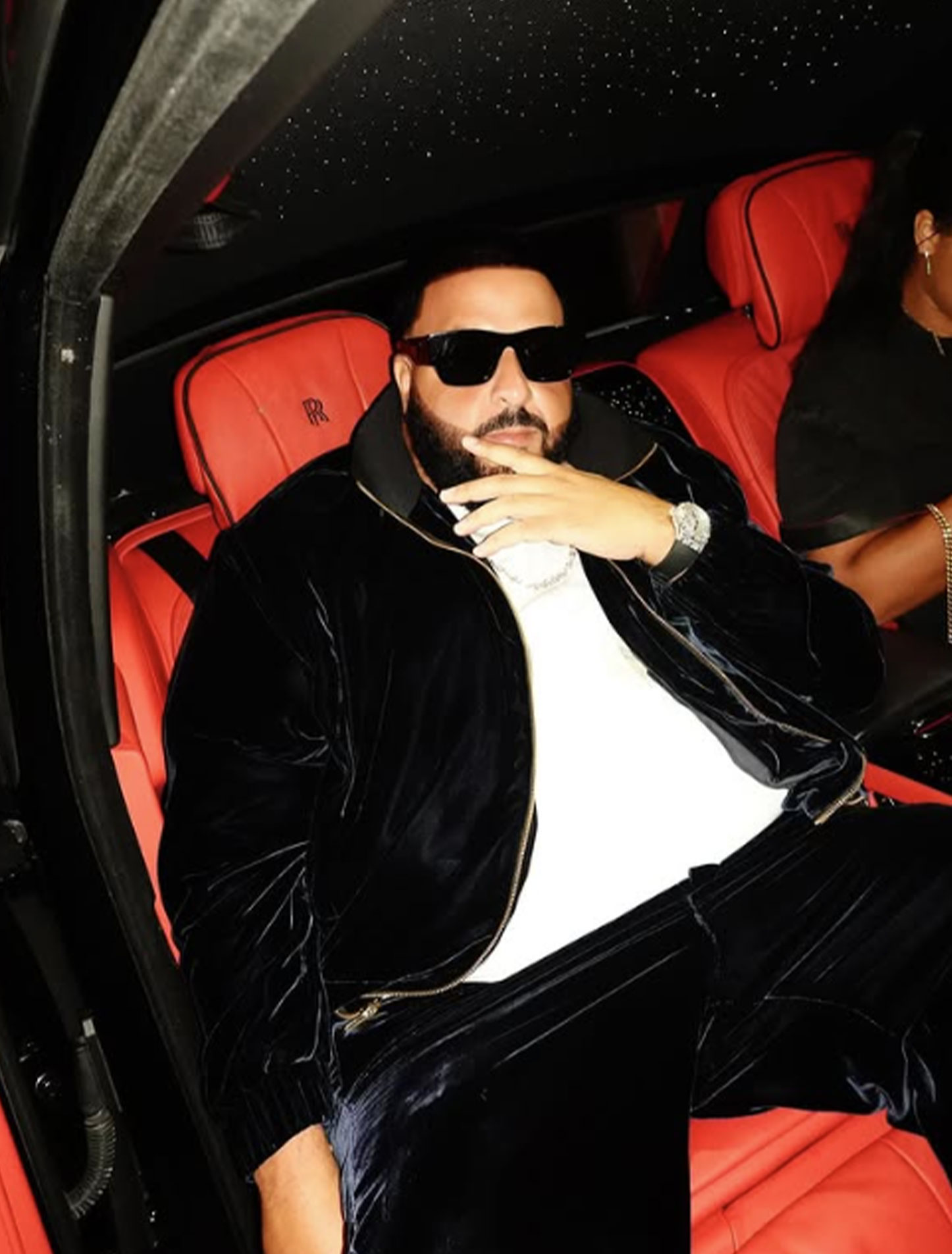 DJ Khaled wears Avi & Co. Iced Collection: Color in Motion, 18K White Gold, Black Strap, 44 mm