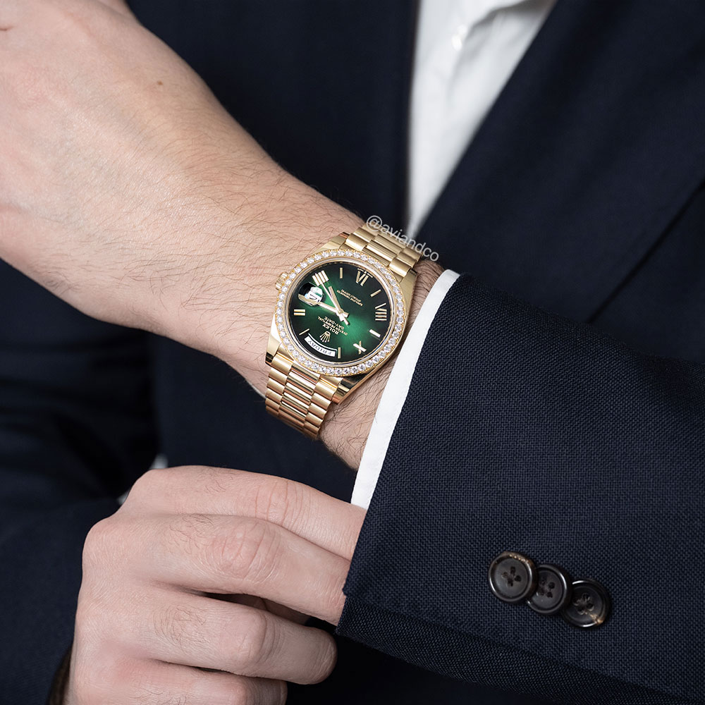 Rolex Day-Date 40, 18K Yellow Gold, Green Roman Dial, President Bracelet